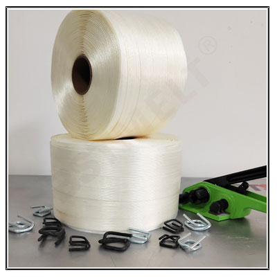 Bale press strapping